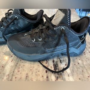 Barely worn. Boy 4Y Jordan 1 take II black/metallic silver shoes!